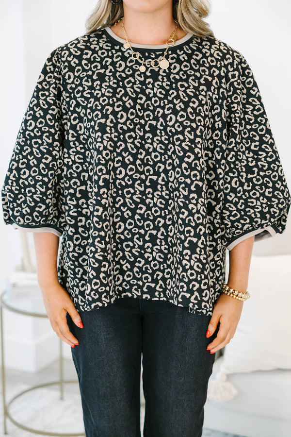 Plus Size leopard jacquard top with elastic puff sleeves, a crew neckline, and a relaxed fit.