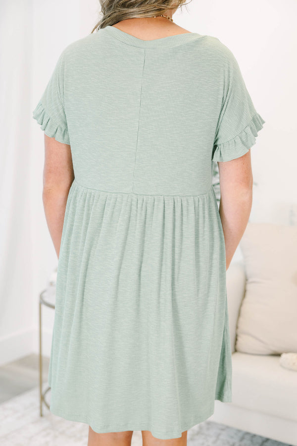Plus Size sea green ribbed knit dress with a V-neckline, ruffled short sleeves, and a tiered skirt.
