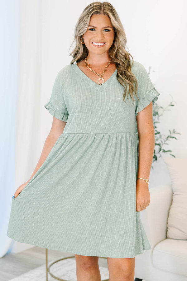 Plus Size sea green ribbed knit dress with a V-neckline, ruffled short sleeves, and a tiered skirt.