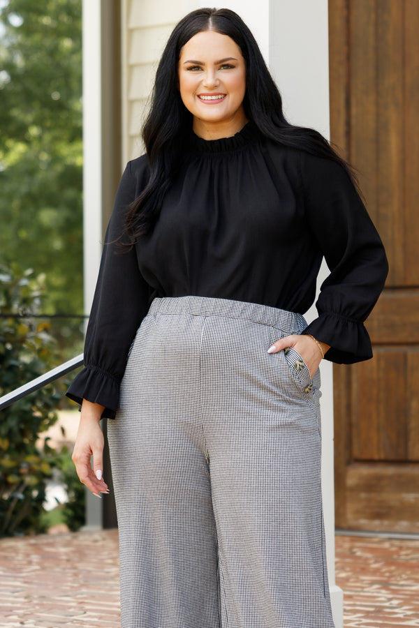 Chic Soul plus size clothing, black top with a high neckline and bubble sleeves