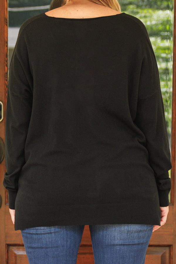 Chic Soul plus size clothing, black sweater with v neckline and textured detail down the center and small slits on the bottom sides