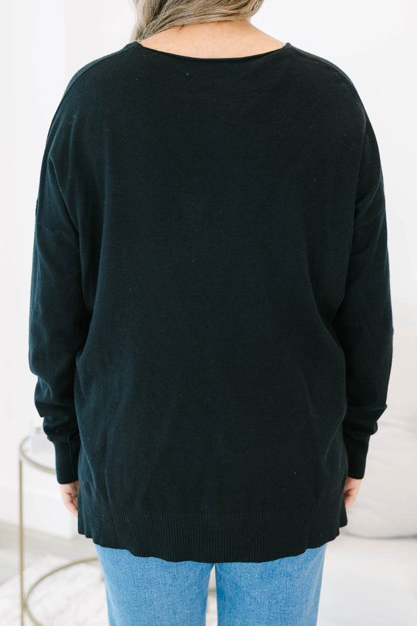 Chic Soul plus size clothing, black sweater with v neckline and textured detail down the center and small slits on the bottom sides