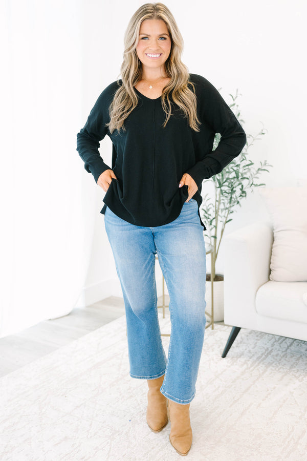 Chic Soul plus size clothing, black sweater with v neckline and textured detail down the center and small slits on the bottom sides