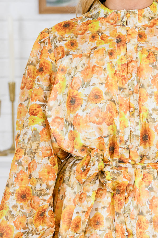 Plus Size amber yellow floral mini dress with a high mock neck, long puff sleeves, and waist sash.