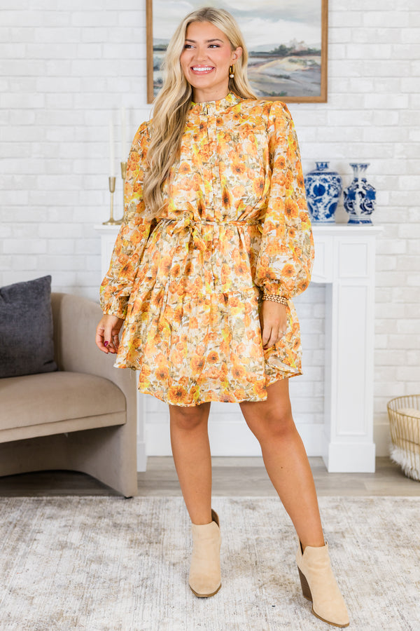 Plus Size amber yellow floral mini dress with a high mock neck, long puff sleeves, and waist sash.