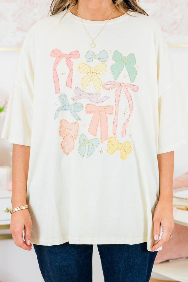 Chic Soul plus size clothing, ivory boyfriend tee with multicolor bows in various shapes and sizes