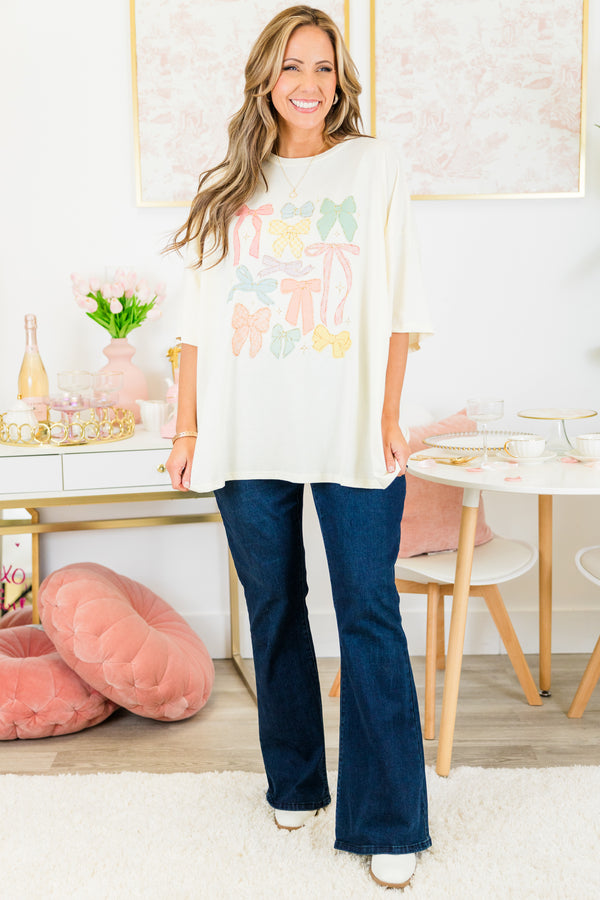 Chic Soul plus size clothing, ivory boyfriend tee with multicolor bows in various shapes and sizes