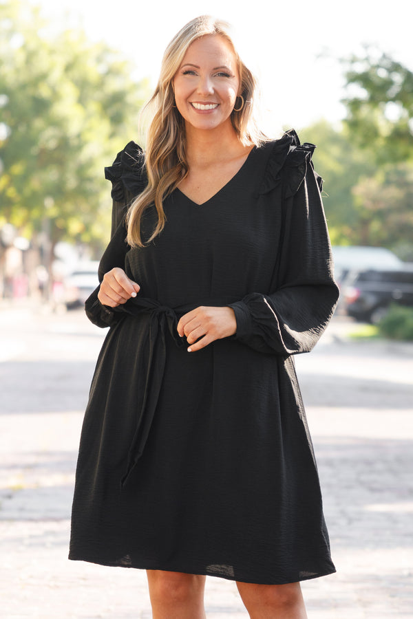 Chic Soul plus size clothing, black short dress with long sleeves and ruffle details and a tie around the waist