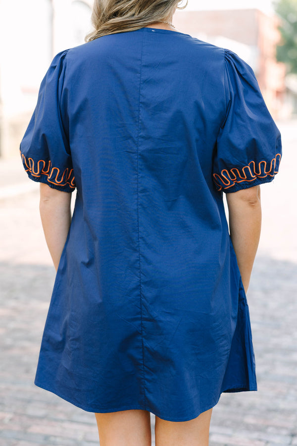 Plus Size blue cotton V-neck dress with orange zigzag embroidery and elastic puff sleeves.