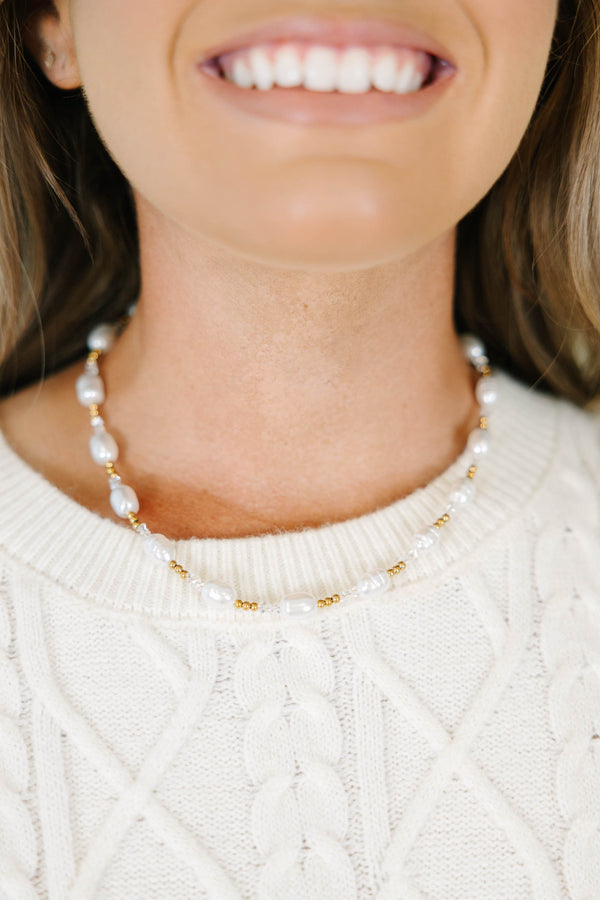 Morning Muse Necklace with white pearls and gold bead accents.
