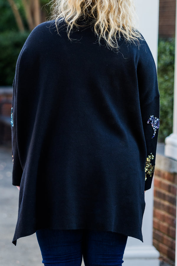 Chic Soul plus size clothing, black long sleeve knit top with slits along side and mock neckline with sequin multicolor animals