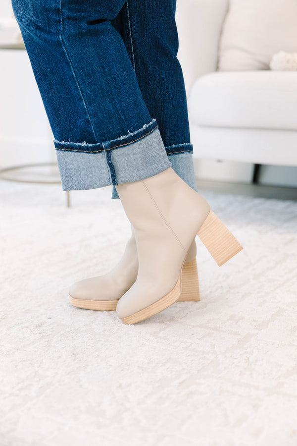 light cream Booties with a wooden block heel and platform.