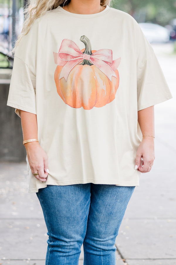 Chic Soul plus size clothing, beige short sleeve boyfriend tee with orange pumpkin graphic with a pink bow on the stem