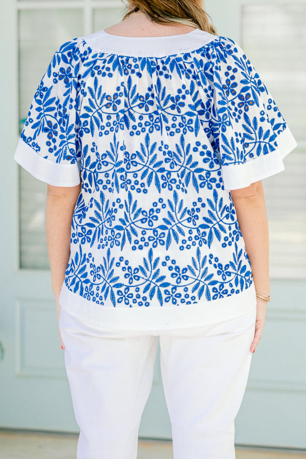 Chic Soul Plus size clothing, off white top with a blue floral pattern and a slight v-neck 

