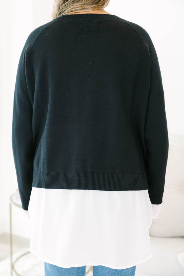 Chic Soul plus size clothing, black long sleeve knit sweater top with round neckline and cuff sleeves with white button up shirt underneath peeking out the bottom and sleeves