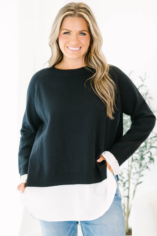Chic Soul plus size clothing, black long sleeve knit sweater top with round neckline and cuff sleeves with white button up shirt underneath peeking out the bottom and sleeves