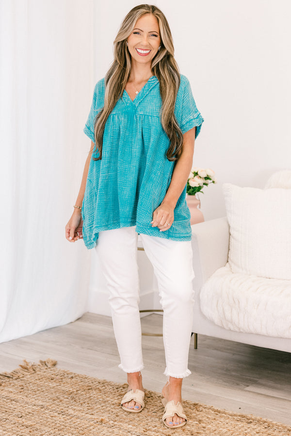 Chic Soul plus size clothing, short-sleeve light teal green mineral wash top with a high-low hemline and a v-neckline with subtle distressing 