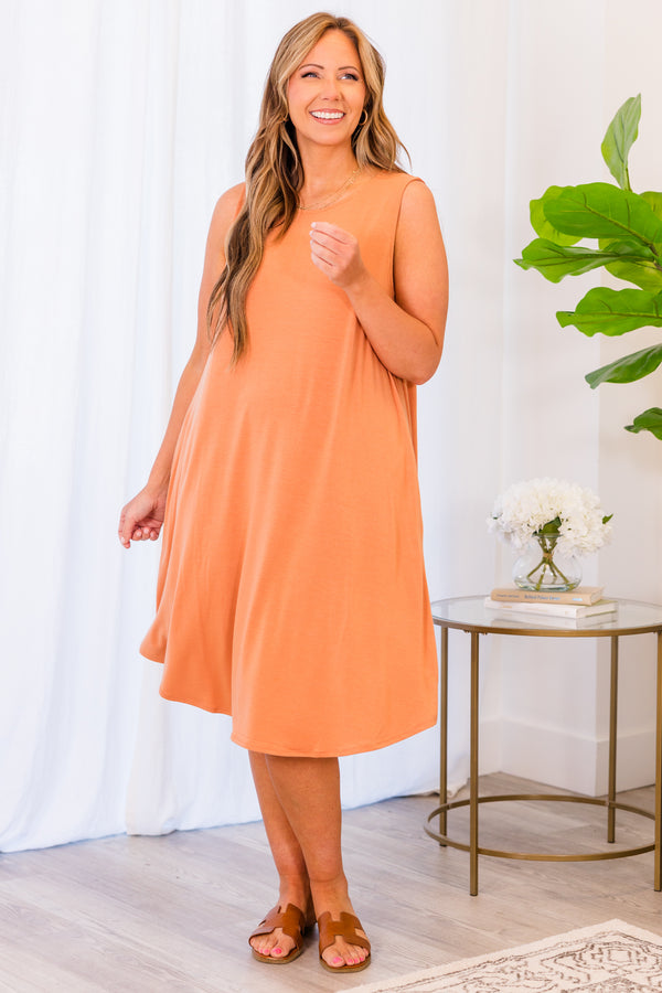 Plus Size sleeveless butter orange swing dress with a round neckline and side pockets.