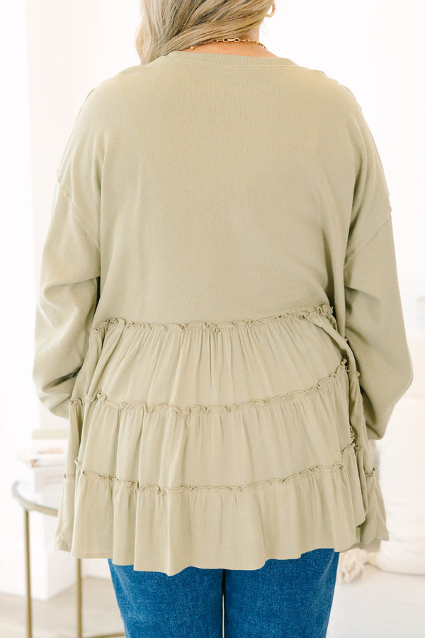 Chic Soul plus size clothing, olive long sleeve top with round neckline and cuff sleeves with tiered ruffle detail along the bottom