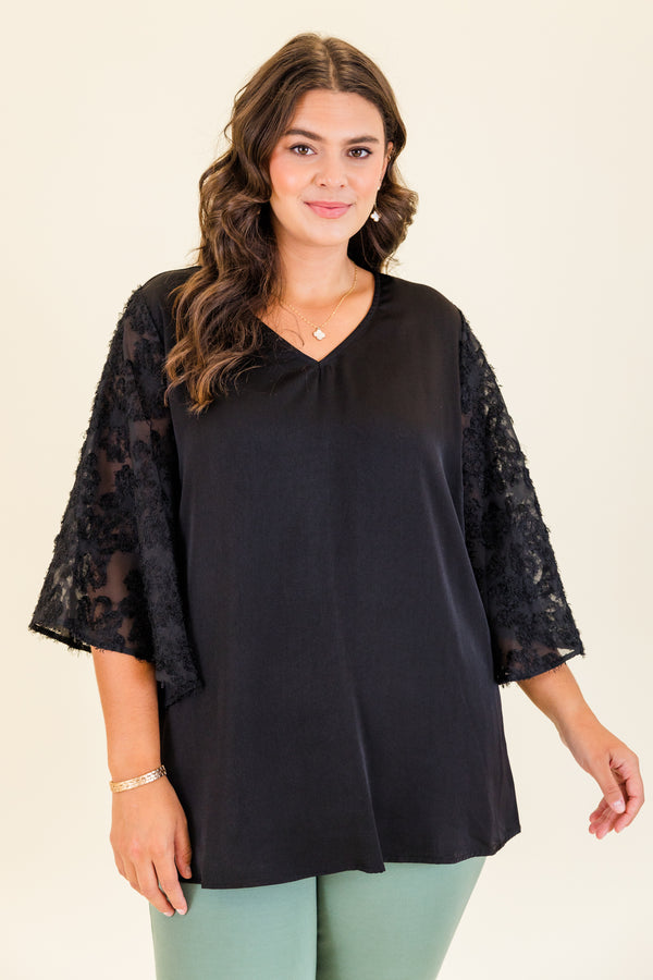 Chic Soul plus size clothing, short-sleeve black top with v-neckline and black lace sleeves with abstract stitching details