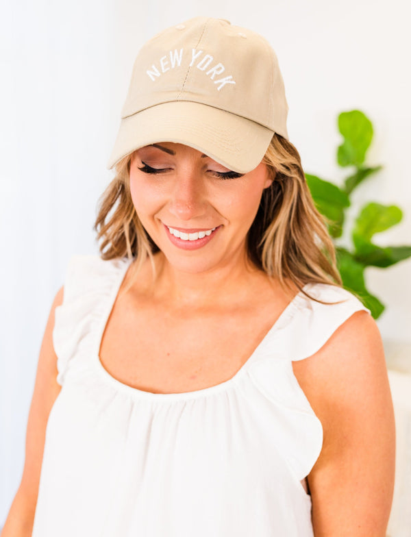 Plus Size ash mocha baseball cap with white embroidered New York text on the front.