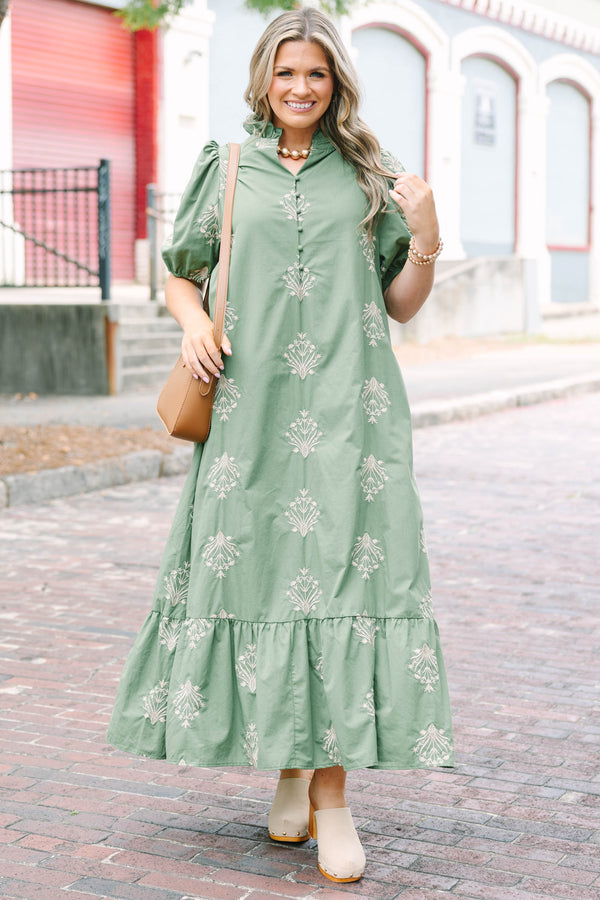 Plus Size olive green midi dress with cream botanical embroidery, puff sleeves, and a ruffled hem.
