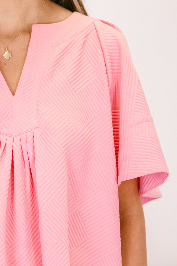 Chic Soul plus size clothing, short-sleeve pink textured top with a split-v-neckline and subtle smocking on the bodice 