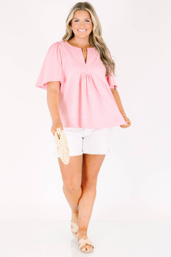 Chic Soul plus size clothing, short-sleeve pink textured top with a split-v-neckline and subtle smocking on the bodice 