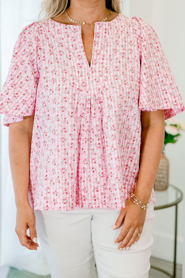 Chic Soul plus size clothing, pink short sleeve top with a floral pattern and flowy sleeves 