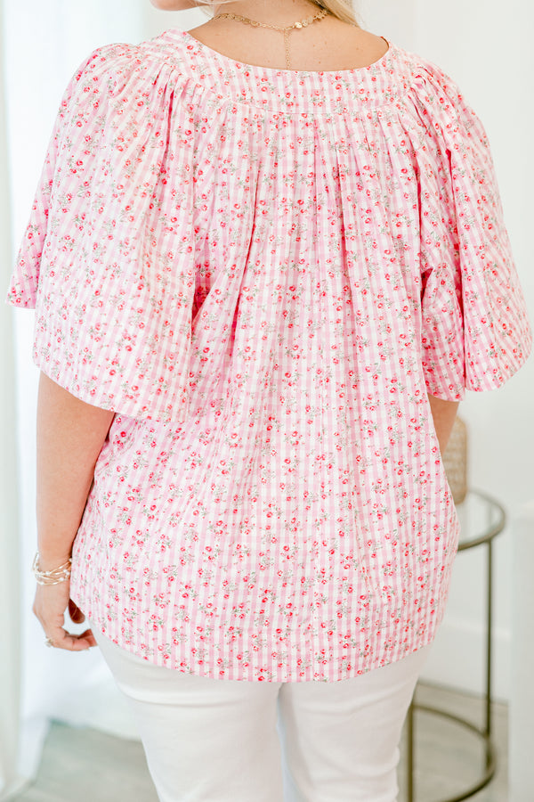 Chic Soul plus size clothing, pink short sleeve top with a floral pattern and flowy sleeves 