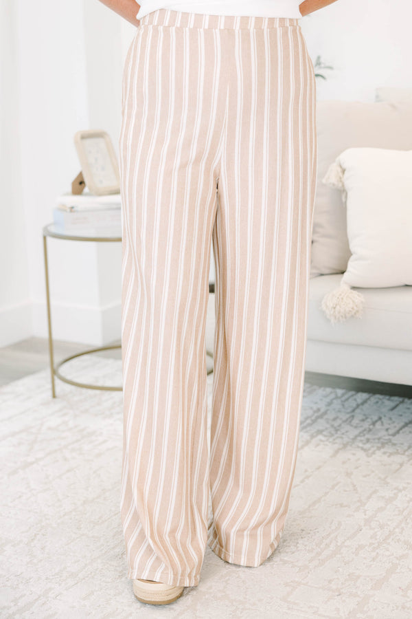 Plus Size khaki and off-white vertical striped wide-leg pants with a relaxed fit.