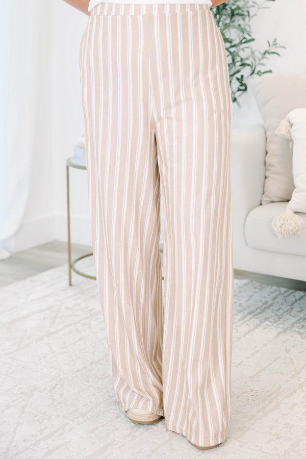 Plus Size khaki and off-white vertical striped wide-leg pants with a relaxed fit.