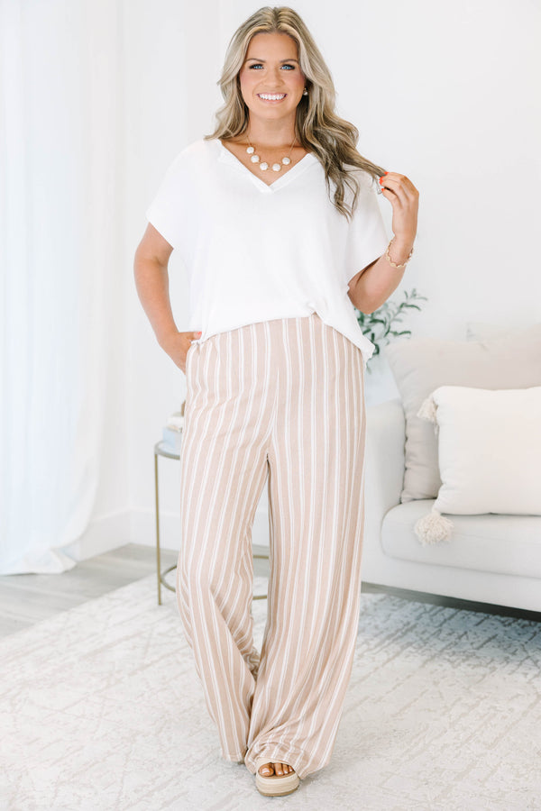 Plus Size khaki and off-white vertical striped wide-leg pants with a relaxed fit.