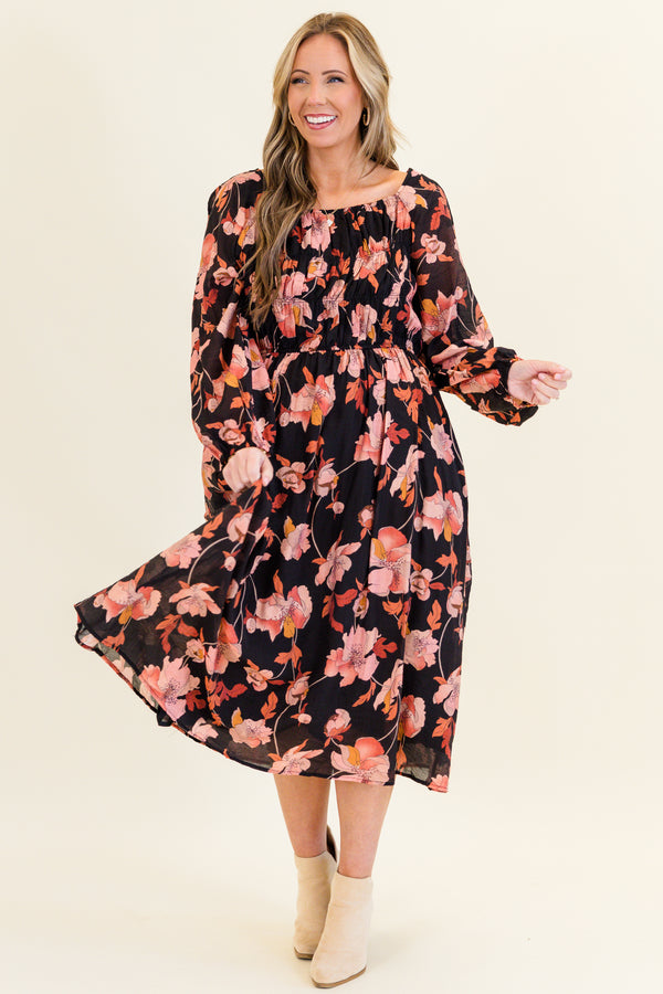 Chic Soul plus size clothing, black long sleeve midi dress with cinched waist detail with smocked top and square neckline with cuffed sleeves and pink/orange floral print
