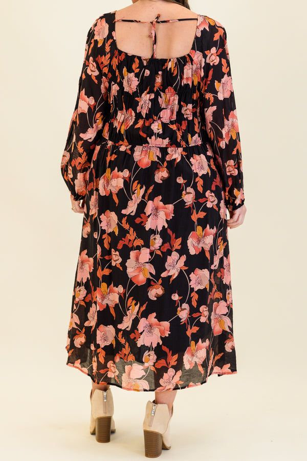Chic Soul plus size clothing, black long sleeve midi dress with cinched waist detail with smocked top and square neckline with cuffed sleeves and pink/orange floral print

