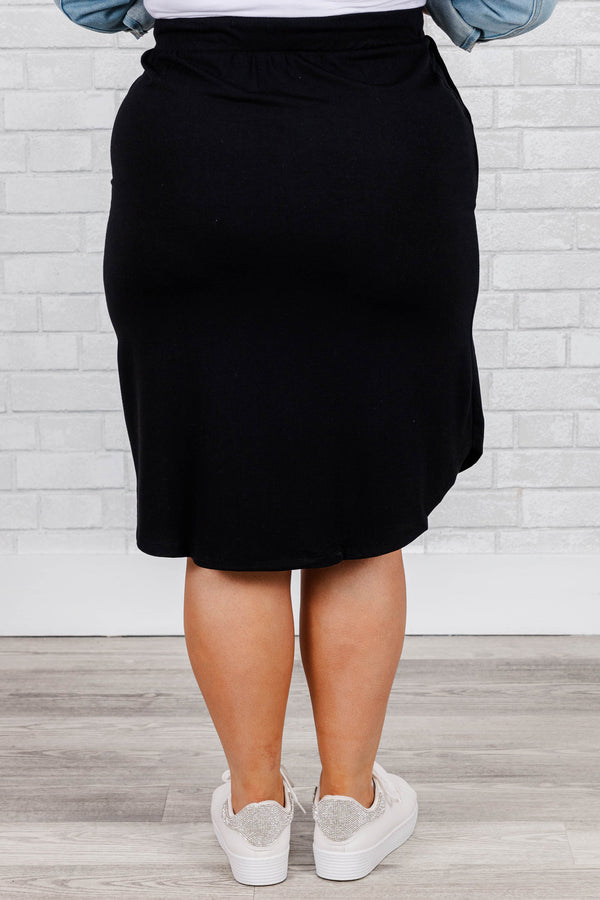 Chic Soul plus size clothing, black knee length skirt with tie at waist and pockets