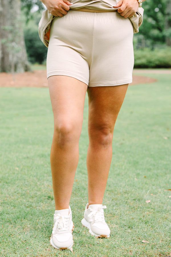 Chic Soul plus size clothing, taupe sleeveless athletic dress with a scooped neckline and pockets on the front of the dress