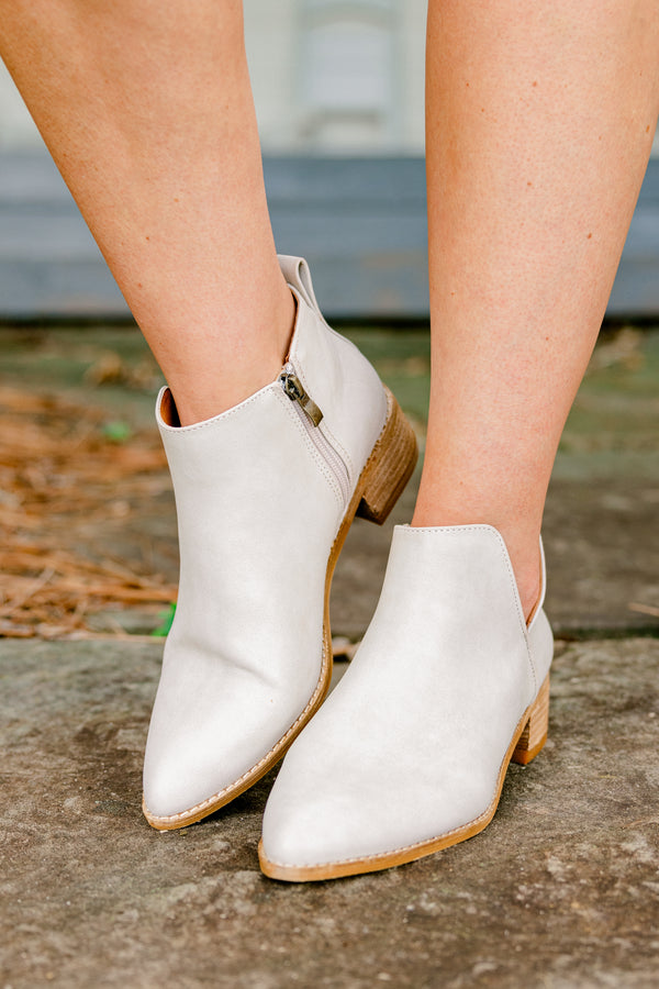 Chic Soul Plus size clothing, sand colored leather booties that come to a point at the end of the toes and have a zipper on the side 
