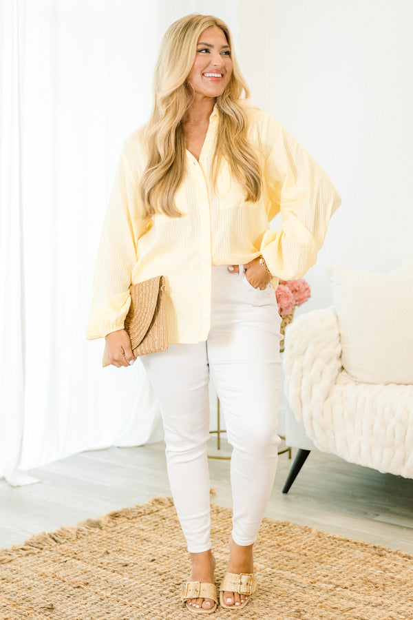 Chic Soul plus size clothing, light yellow long puff sleeve top with collar, button down front, and two breast pockets