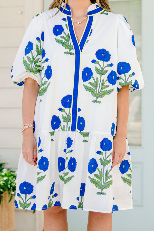 Chic Soul plus size clothing, white short sleeve mini dress with v neckline and collar detail with blue and green floral print with puff sleeves and blue border down neckline and center