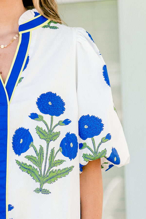 Chic Soul plus size clothing, white short sleeve mini dress with v neckline and collar detail with blue and green floral print with puff sleeves and blue border down neckline and center