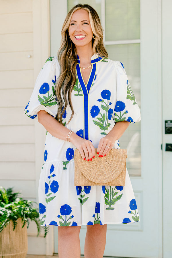 Chic Soul plus size clothing, white short sleeve mini dress with v neckline and collar detail with blue and green floral print with puff sleeves and blue border down neckline and center
