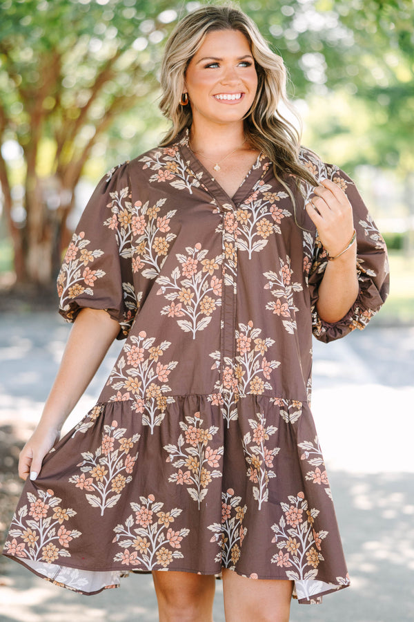 Plus Size brown floral mini dress with puff sleeves, a v-neckline, and a tiered skirt.