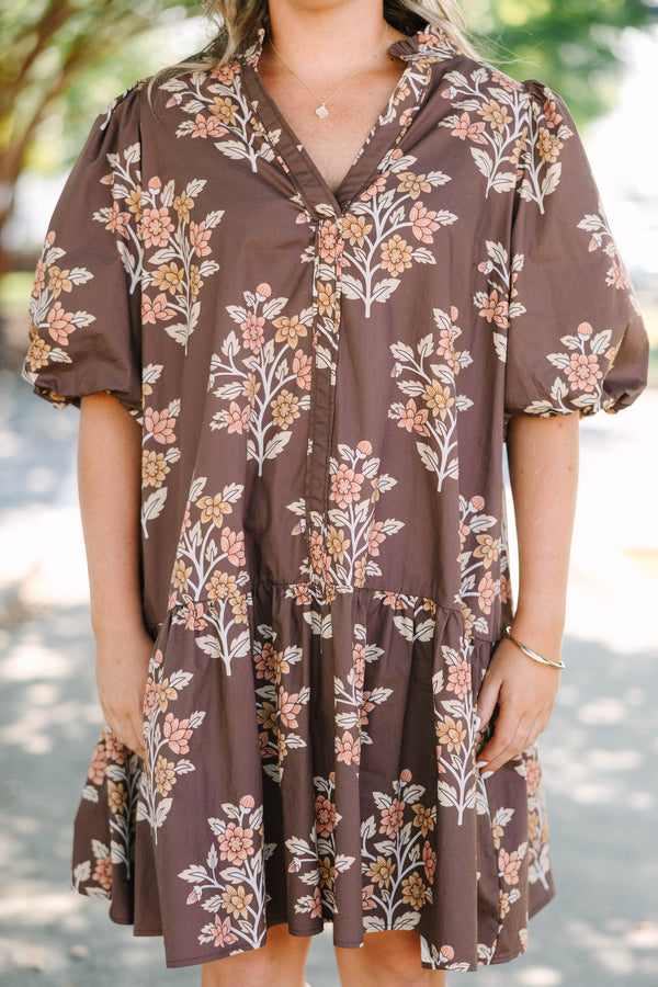 Plus Size brown floral mini dress with puff sleeves, a v-neckline, and a tiered skirt.