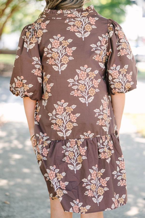 Plus Size brown floral mini dress with puff sleeves, a v-neckline, and a tiered skirt.