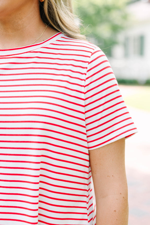 red and white striped plus size top with a relaxed fit and short sleeves.