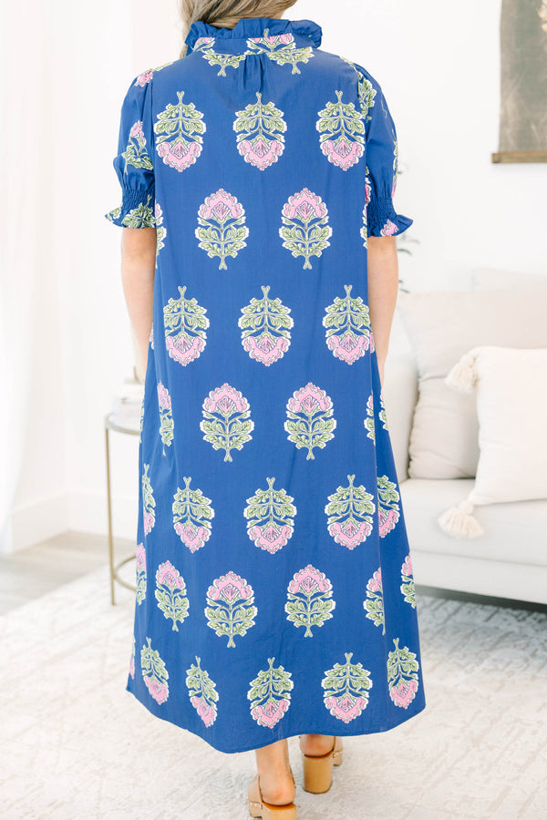 Plus Size navy floral maxi dress with short puff sleeves, a ruffled collar, and pink flower motifs.