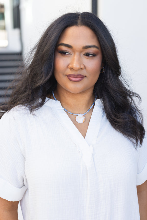 Chic Soul plus size clothing, blue beaded necklace with a seashell charm hanging off the center of the beads 