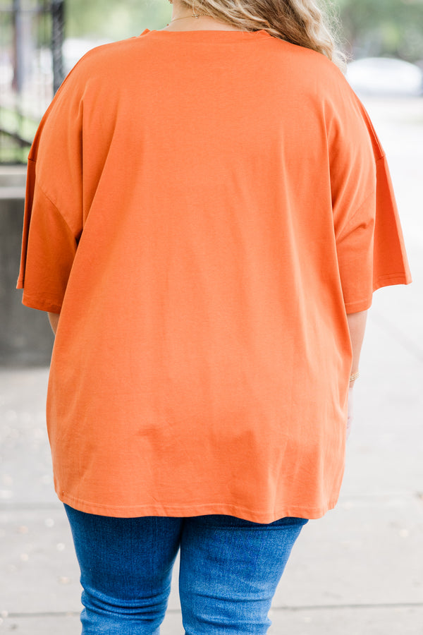 Chic Soul plus size clothing, rust orange short sleeve boyfriend tee with pumpkin jack-o-lantern graphic design