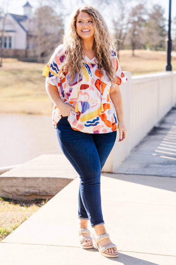 Chic Soul plus size clothing, mustard short sleeve top with v neck and tie detail with tassels and geometric print